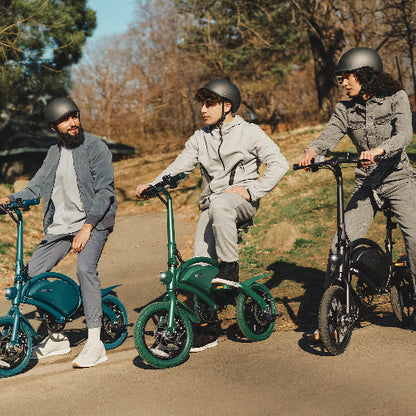 Group of riders on Jetson Bolt Pro Foldable E-Bikes enjoying a park ride, showcasing compact electric bike design and portability