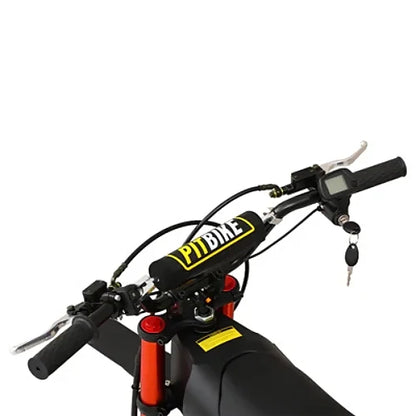 Close-up of handlebars and digital display on Kugoo Wish 01 electric dirt bike