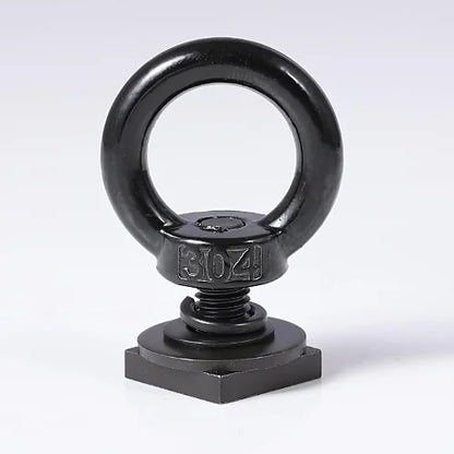 Close-up of M8 T-track tie down anchor bolts with washers and square base for securing straps or bungee cords