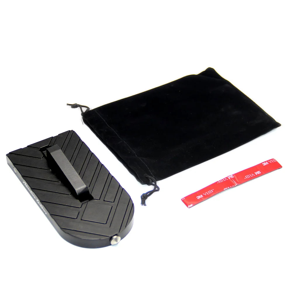 Black AO door step folded for storage shown next to included pouch

