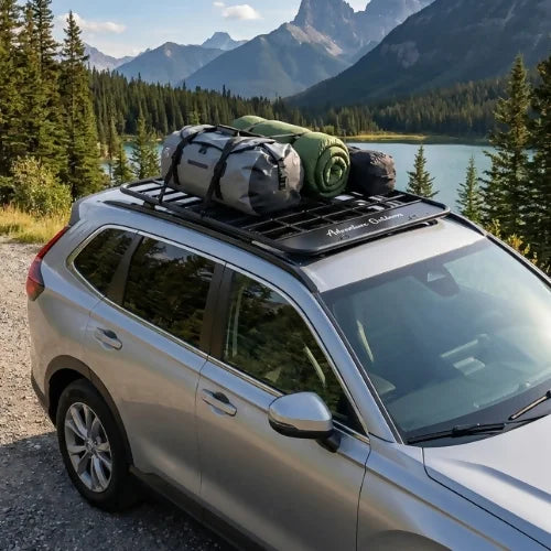 Ore AO ultra-low-profile cargo basket platform carrying camping gear on a silver SUV