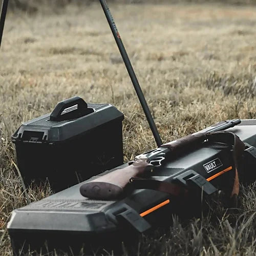 Pelican V770 Vault Single Rifle Case loaded into truck bed in outdoor setting