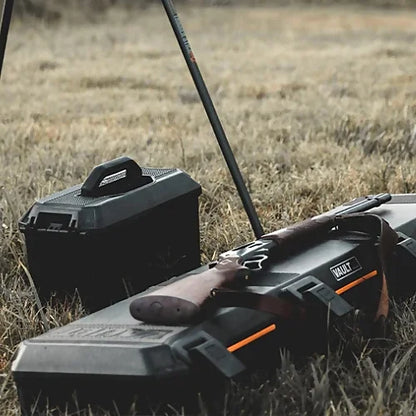 Pelican V770 Vault Single Rifle Case loaded into truck bed in outdoor setting