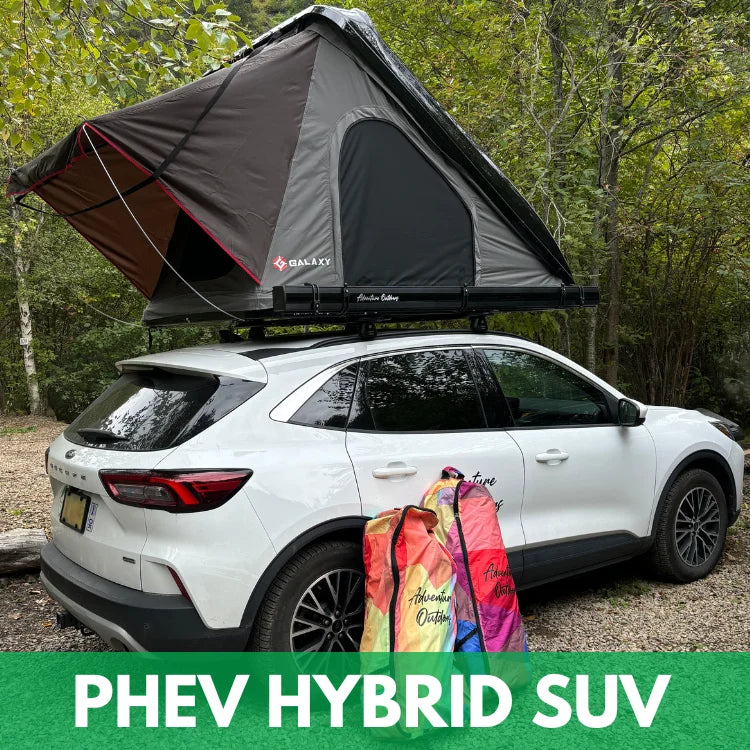 White phev hybrid SUV for rent with a rooftop tent in a forest setting, featuring the brand 'Galaxy'.