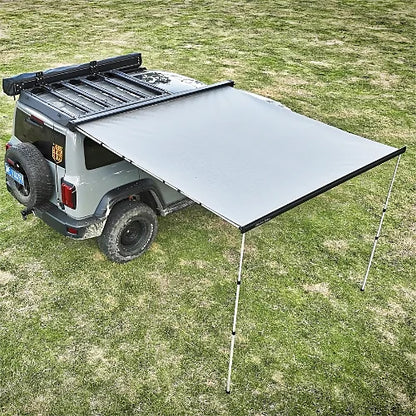 ReTract AO Auto Retractable Awning fully extended beside off-road vehicle for sun and weather protection
