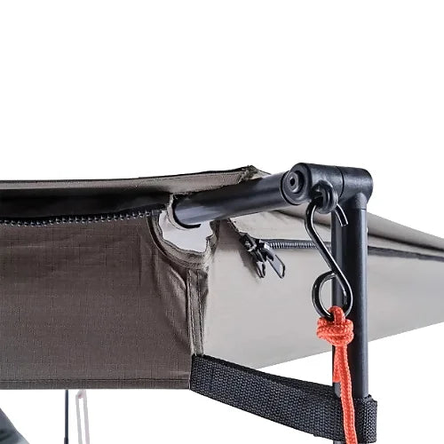 Close-up of corner joint and hook securing awning extension in place