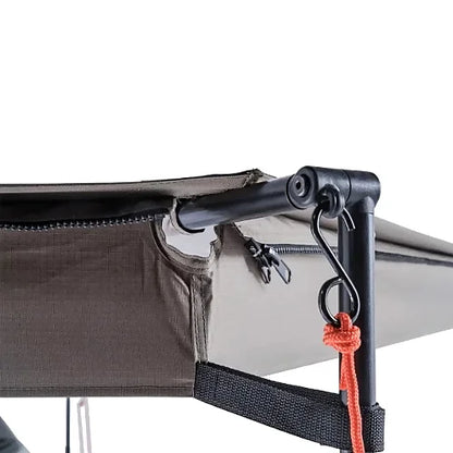 Close-up of corner joint and hook securing awning extension in place