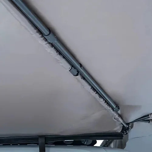 Close-up of Batwing Awning roof support arm joints and fabric tension
