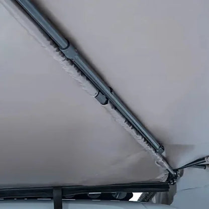 Close-up of Batwing Awning roof support arm joints and fabric tension