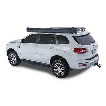 Side view of folded Rhino-Rack Batwing Awning on vehicle roof rack