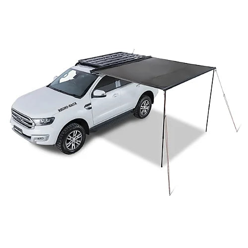 Rhino-Rack Sunseeker 2.5m awning setup on SUV from diagonal angle