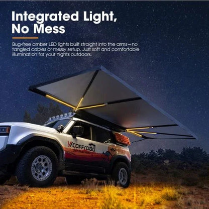 San Hima 180 degree camping awning with integrated amber LED lights for nighttime outdoor setup