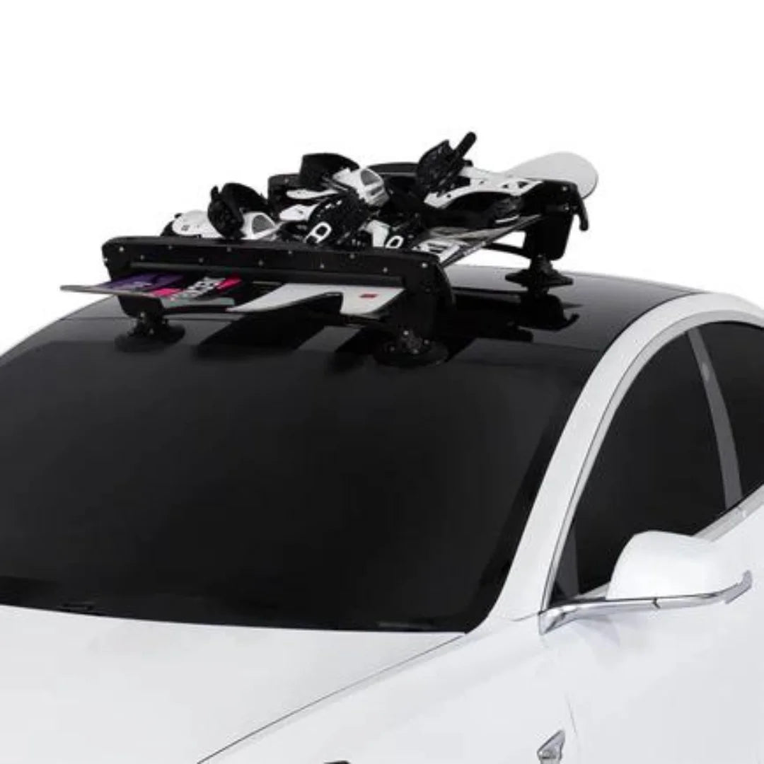Angled side view of ski rack on vehicle with ski gear.