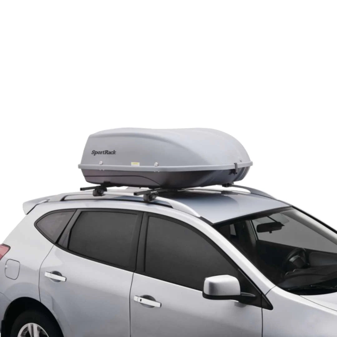 SportRack Skyline XL silver cargo box on white crossover vehicle, passenger side view.