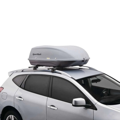 SportRack Skyline XL silver cargo box on white crossover vehicle, passenger side view.