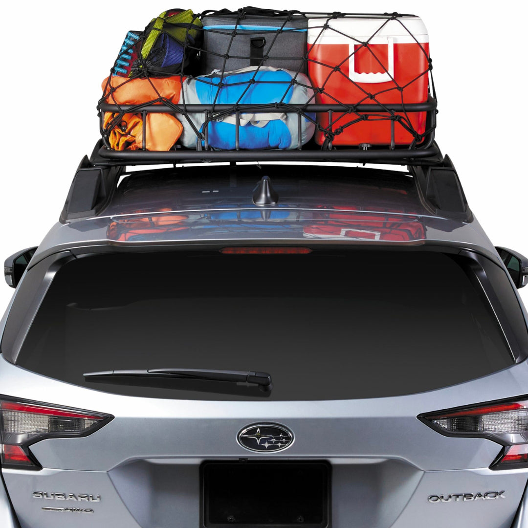 Fully loaded Vista Basket with camping gear on SUV roof, rear angle view.