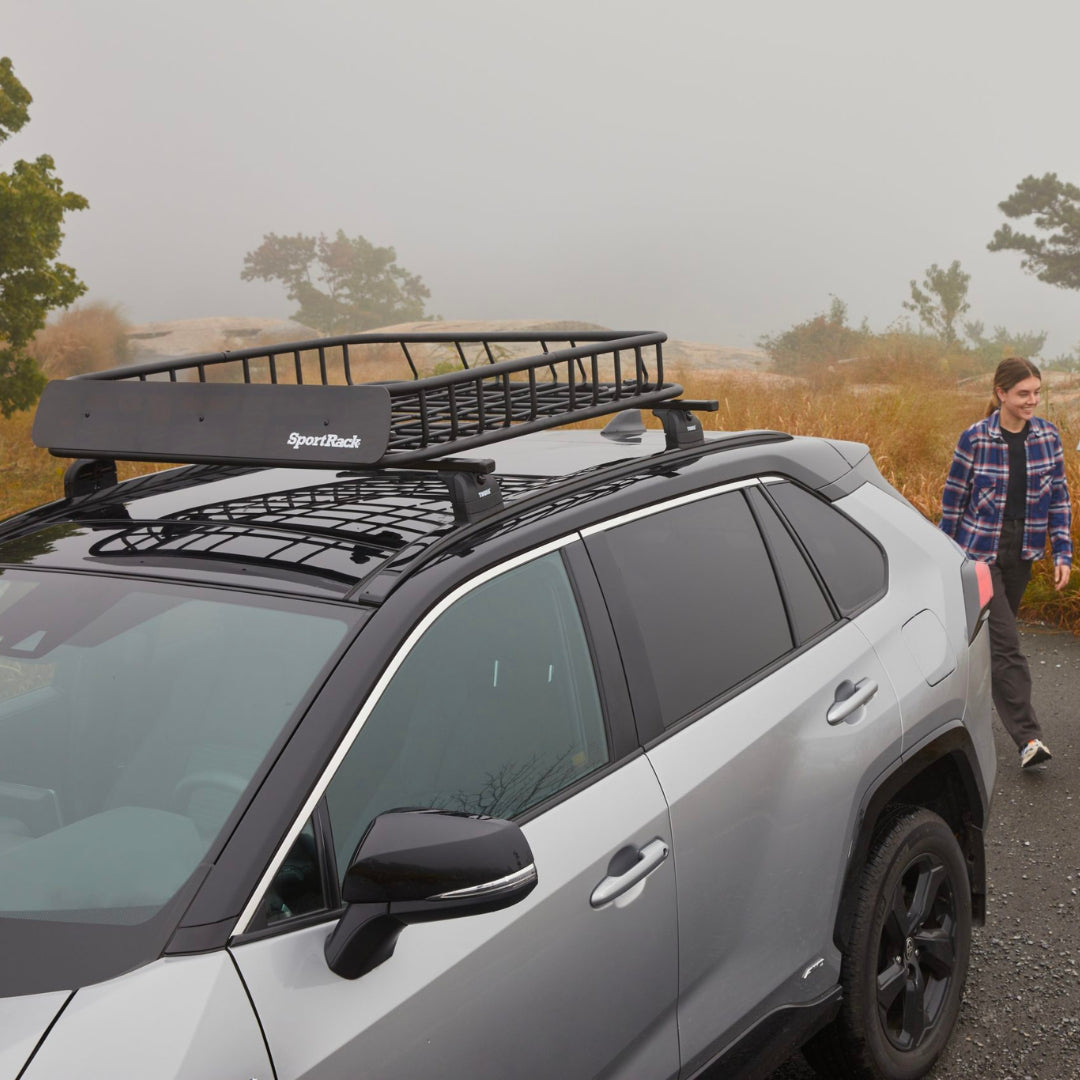 Vista Roof Basket installed on silver SUV, parked in outdoor setting, no cargo.