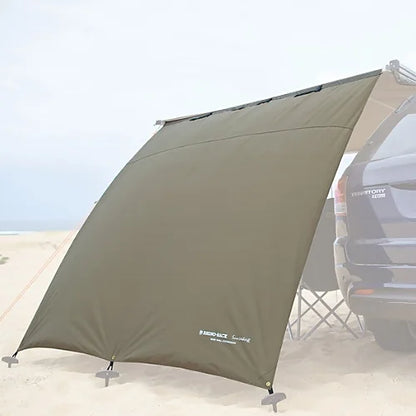 Standalone Sunseeker Awning Side Wall displayed on beach with pegs and guy ropes