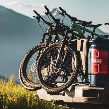 Swagman Paramount Tailgate Pad on the back of a blue truck with 3 bicycles loaded