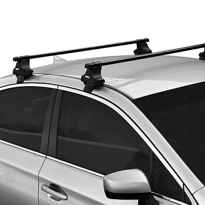 Multi‑bar installation using Thule 480 Traverse Foot Pack on vehicle roof