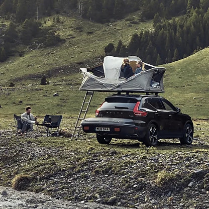 Thule Arcos Platform shown with rooftop tent setup on SUV for camping