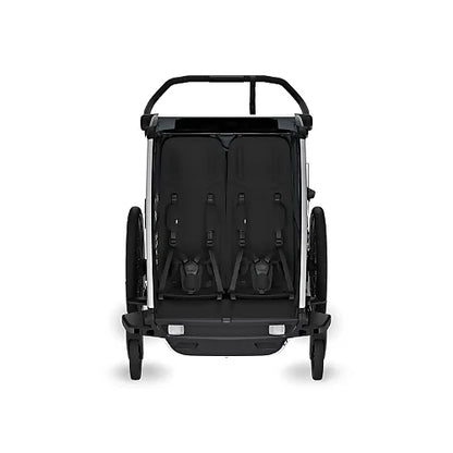 Interior of Thule Chariot Cross 2 Double trailer showing two padded seats and 5-point harness system