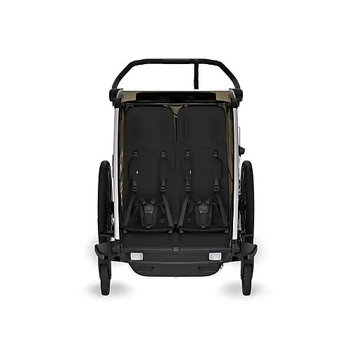 Interior of Thule Chariot Cross 2 Double Faded Khaki with dual padded seats and secure 5-point harness for comfort and safety
