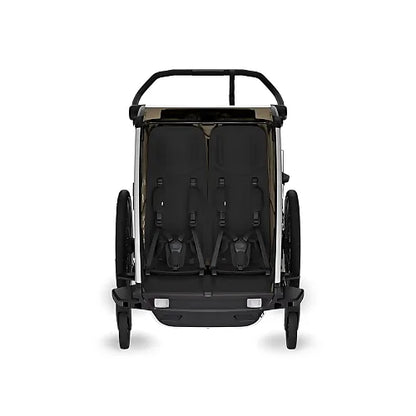 Interior of Thule Chariot Cross 2 Double Faded Khaki with dual padded seats and secure 5-point harness for comfort and safety