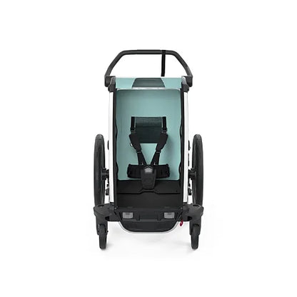 Thule Chariot Cross Single front view showing secure 5-point child harness and padded seating in Alaska Blue