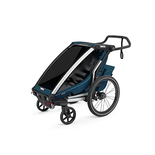 Thule Chariot Cross Single Majolica Blue shown with front jogging wheel for running or fitness use