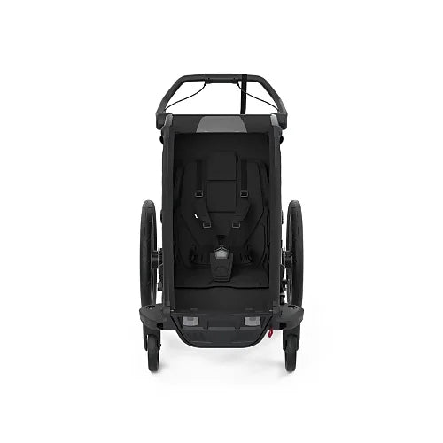 Thule Chariot Sport Single front view showing padded 5-point harness and cabin interior
