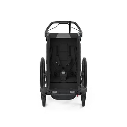 Thule Chariot Sport Single front view showing padded 5-point harness and cabin interior
