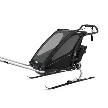 Thule Chariot Sport Single configured for skiing with cross-country ski attachment kit