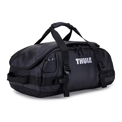 Side profile view of Thule Chasm 30L black duffel bag made from durable recycled materials