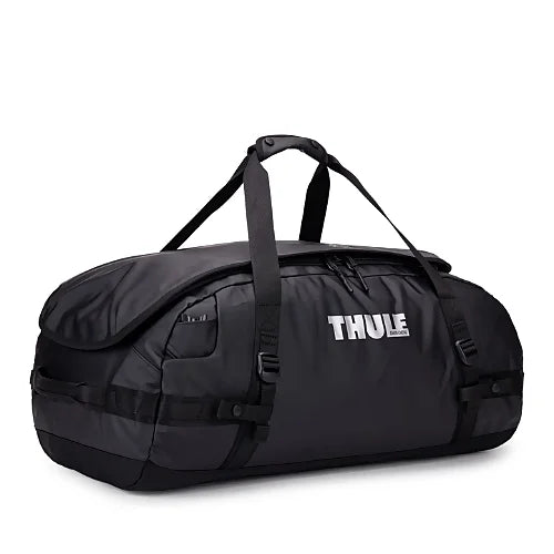 Thule Chasm 70L black duffel bag showing stowable backpack straps for 2-in-1 carrying