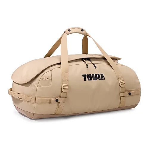 Thule Chasm 70L duffel bag in soft sand shown converting into a backpack