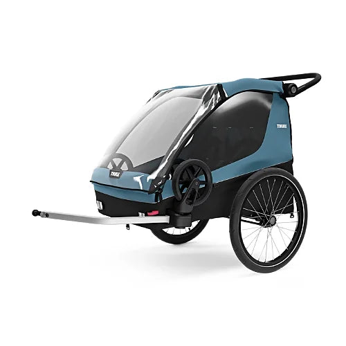 Side angle view of Thule Courier bike trailer with clear rain cover