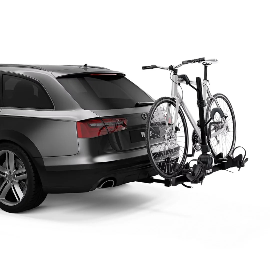 Thule DoubleTrack Pro installed on car, holding one bike