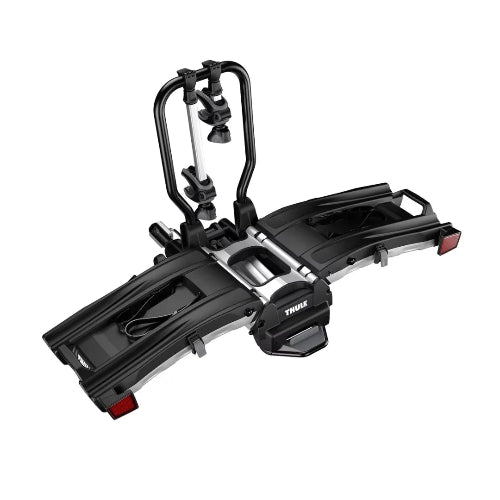 Thule EasyFold XT 2-Bike Hitch Rack angled view showing compact foldable platform design and integrated wheel holders