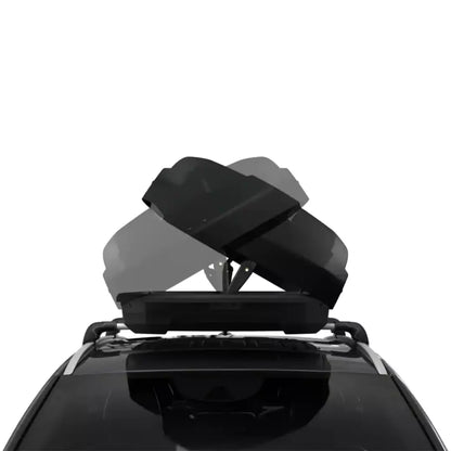 Top-down view showing the dual-sided opening mechanism of the Thule Force XT mounted on a vehicle.