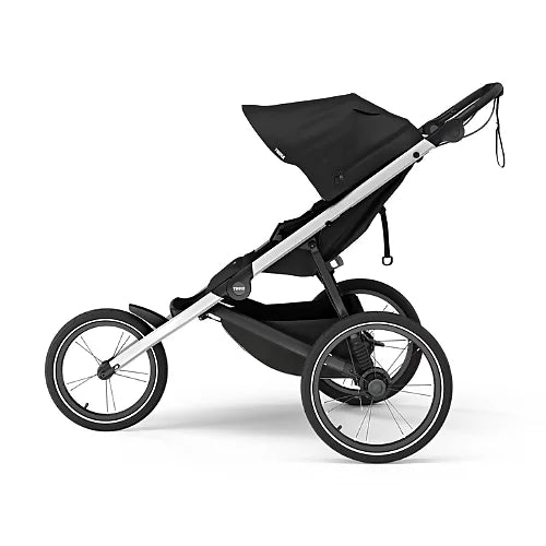Thule Glide 3 jogging stroller in black side profile showing large rear wheels and fixed front wheel for running