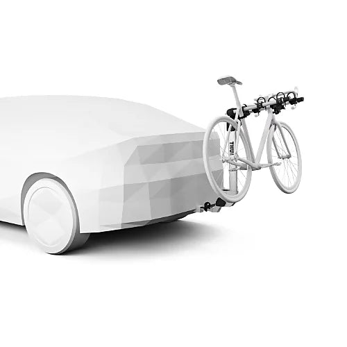 Thule Helium Pro hitch bike rack carrying a road bike on the back of a car