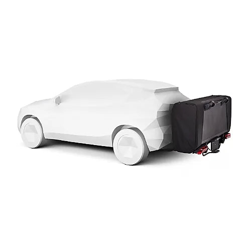 Thule Outset Hitch Car Tent folded with travel cover for protection during transport.