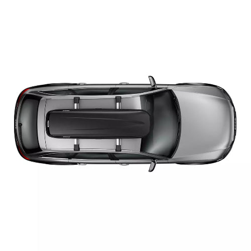 Thule Pulse Alpine roof cargo box mounted on car roof from angled top view showing sleek design and mounting position