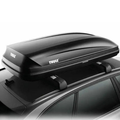 Thule Pulse aerodynamic roof cargo box close-up top angle showing secure FastGrip mounting and streamlined design