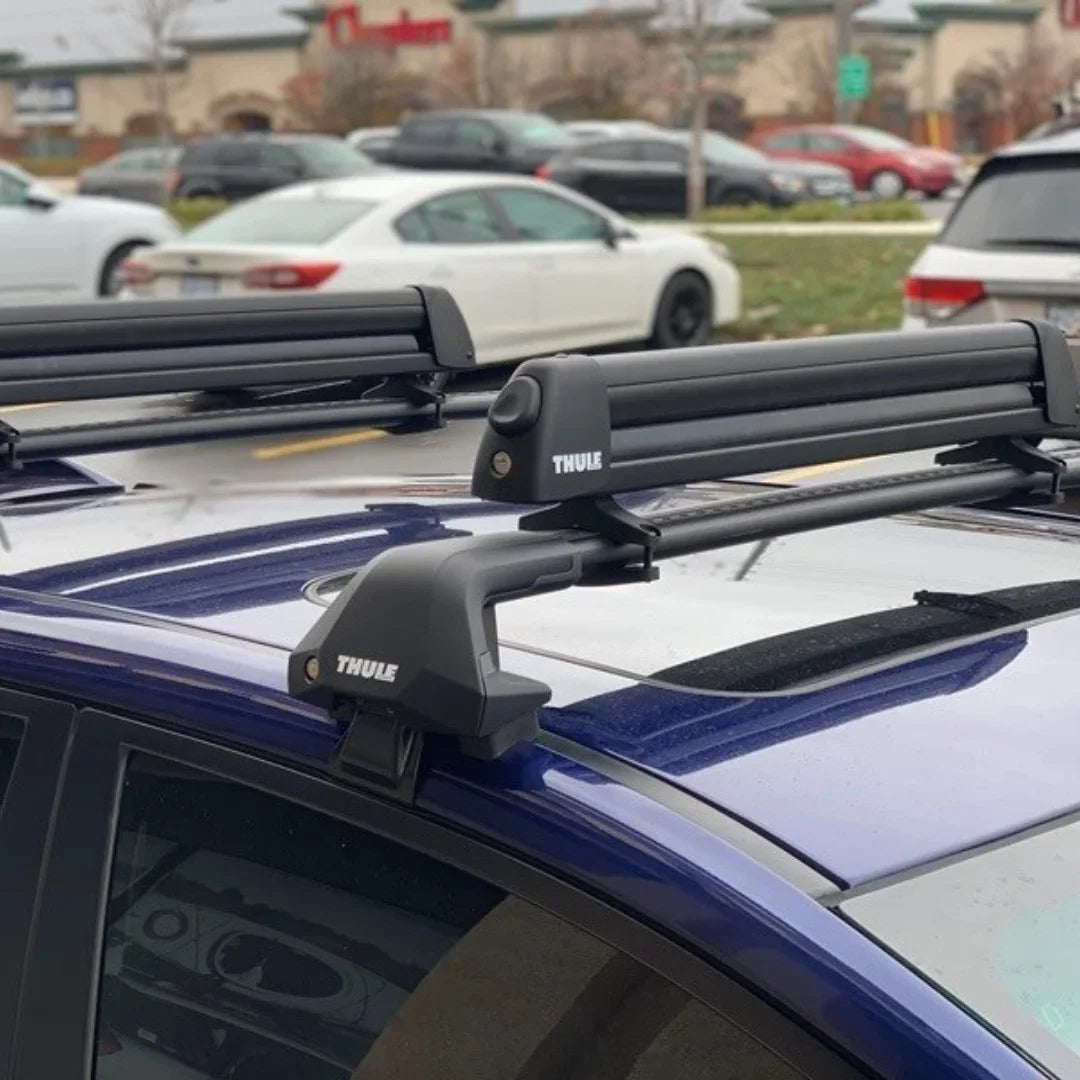 Thule Universal Ski & Snowboard Carrier installed on roof 
