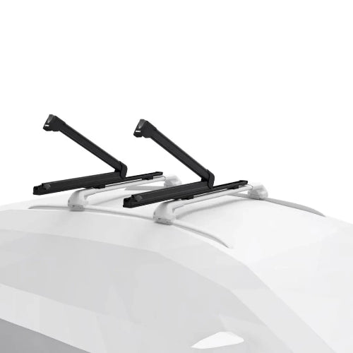 Thule SnowPack Extender dual racks open on car roof ready for ski loading
