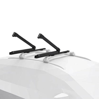 Thule SnowPack Extender dual racks open on car roof ready for ski loading