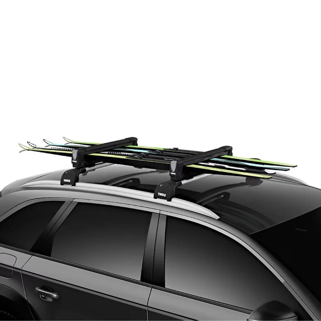 Thule SnowPack wth 4 sets of skis on car roof