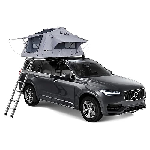 Thule Tepui Ayer 2 rooftop tent mounted on a Volvo SUV with ladder setup and windows open